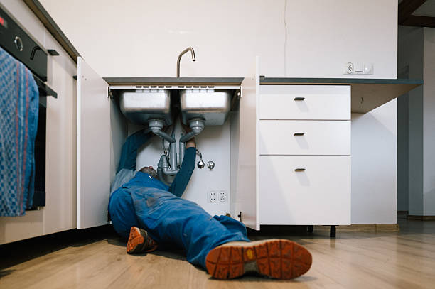 Professional Emergency Plumber technician working in Belgium, WI
